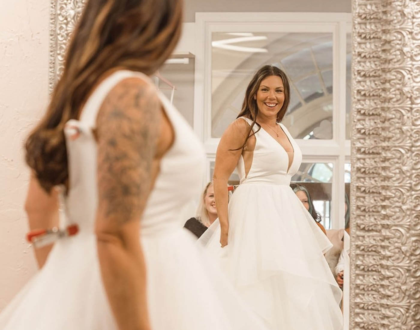 Model wearing a white gown