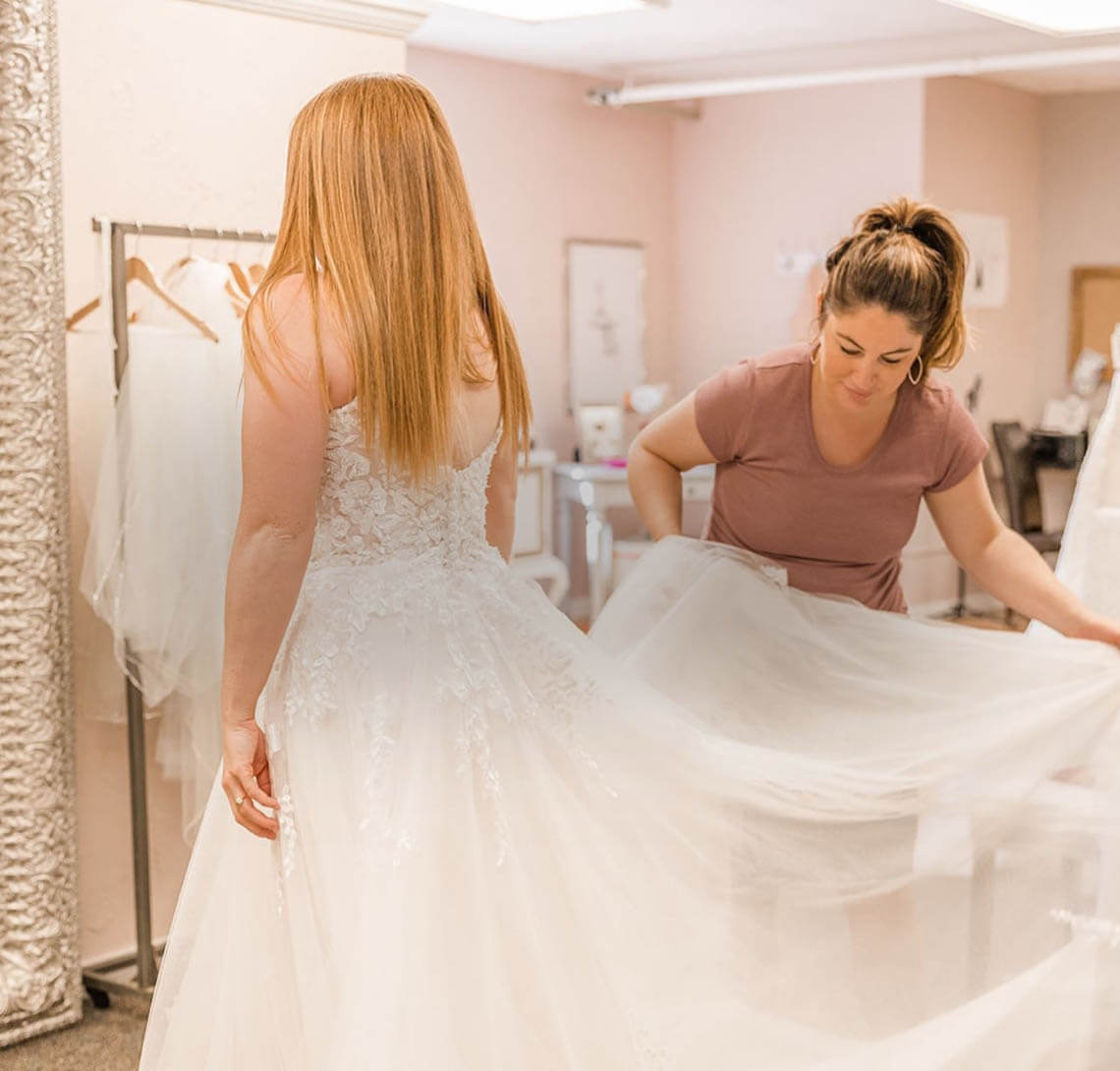 Model wearing a white gown