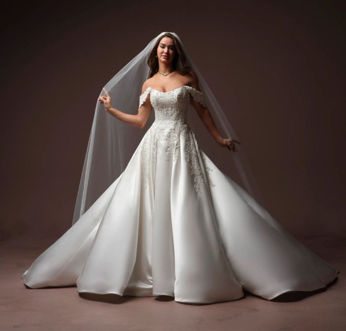 Model wearing a white gown by Maggie Sottero